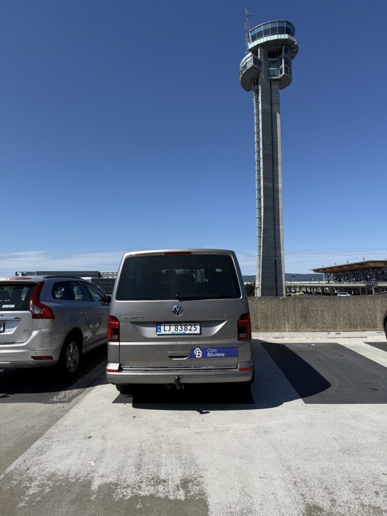 caravelle in front of airport tower in oslo gadermoen